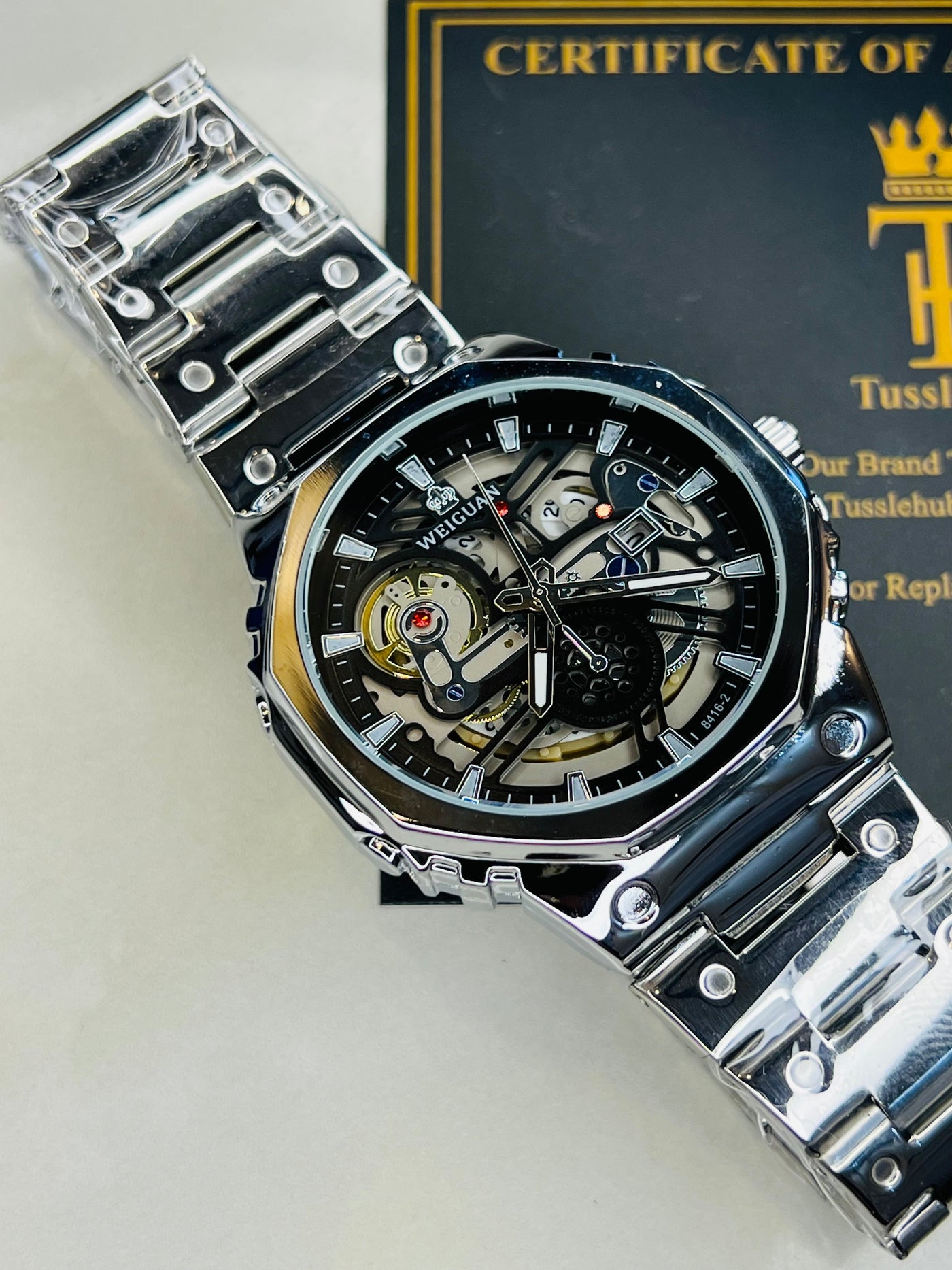 Weiguan Silver Black Skeleton Dial Watch