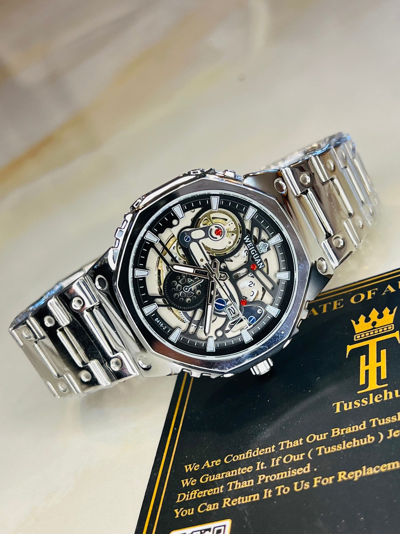 Weiguan Silver Black Skeleton Dial Watch