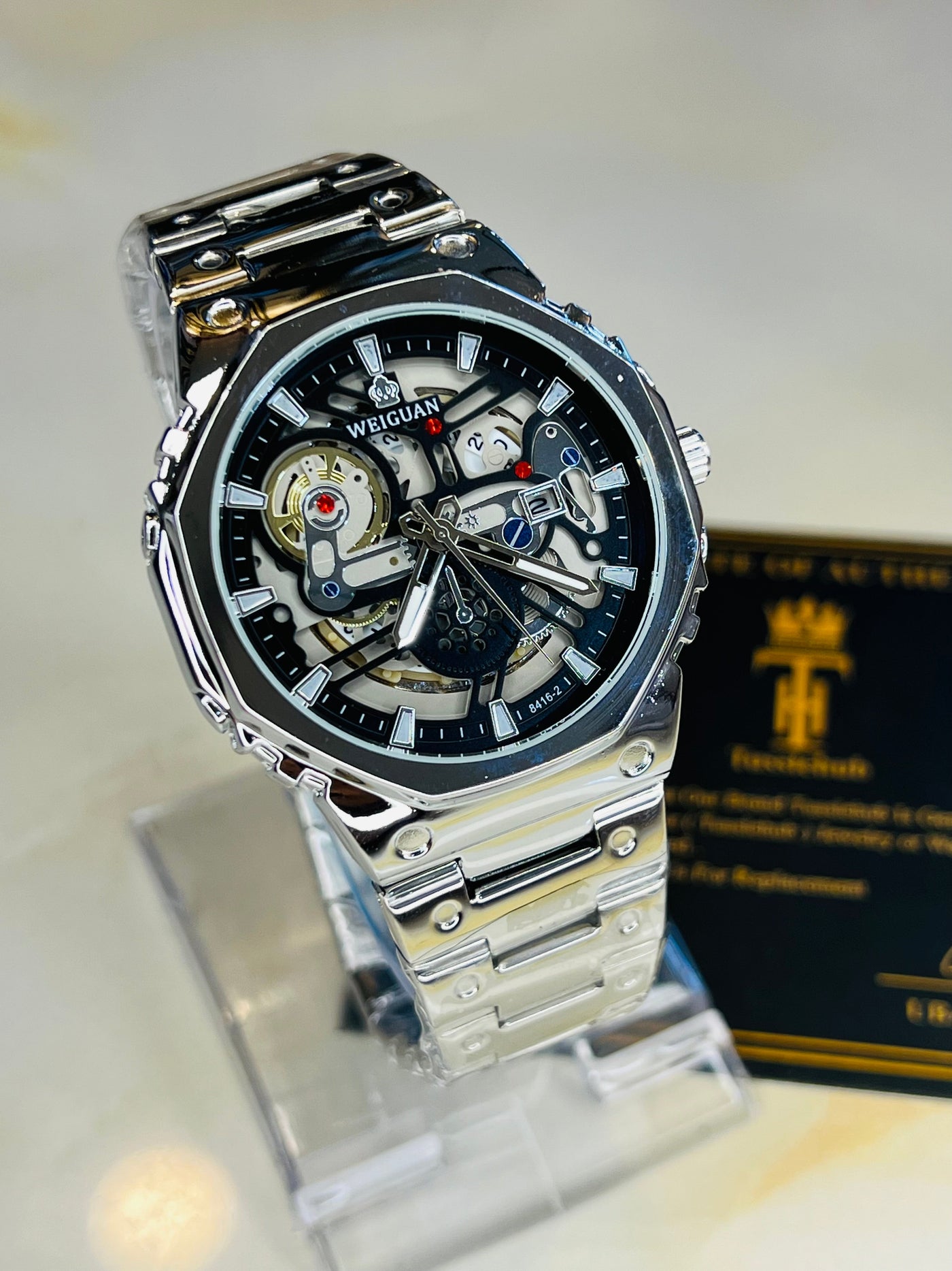 Weiguan Silver Black Skeleton Dial Watch