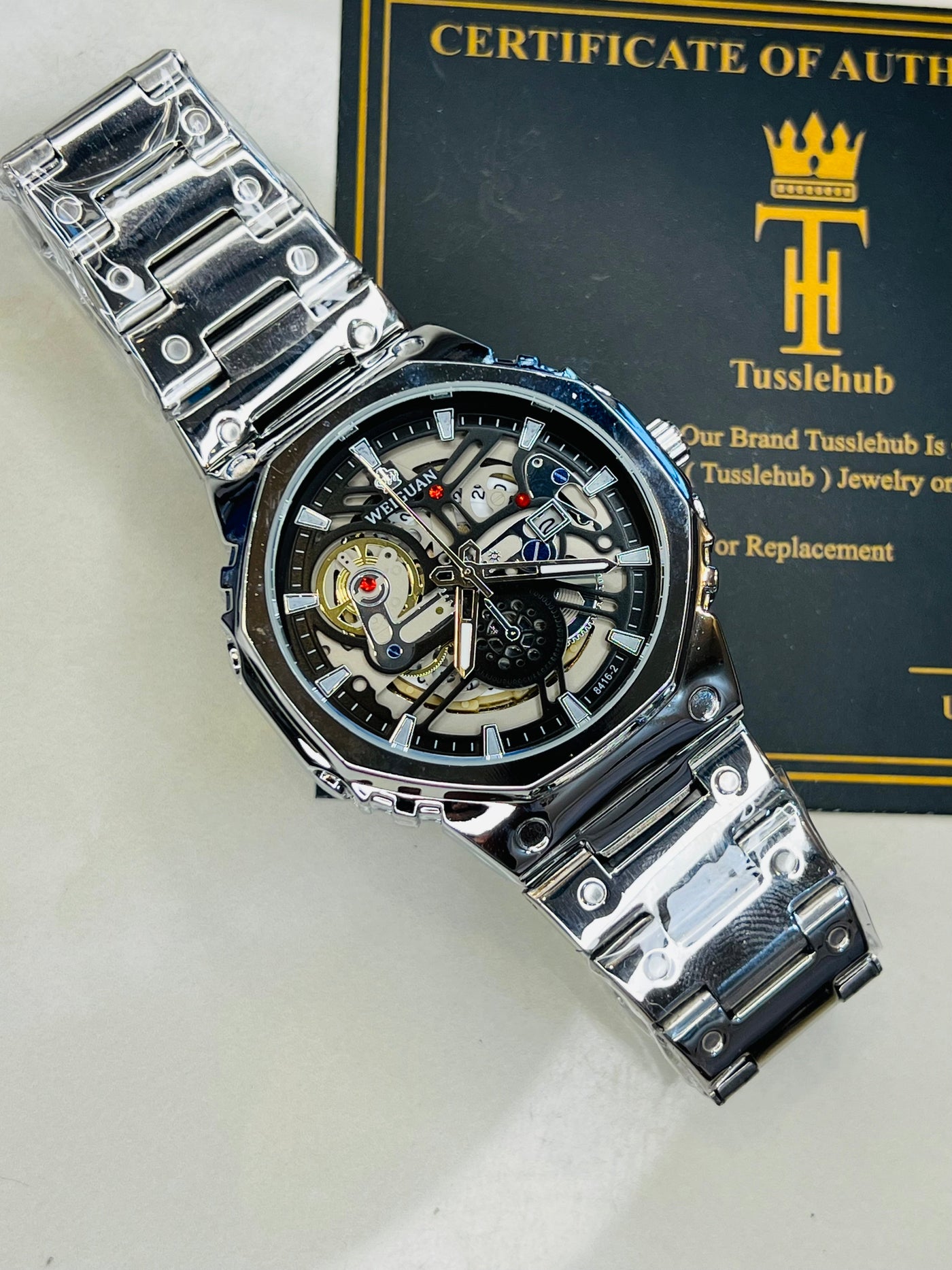 Weiguan Silver Black Skeleton Dial Watch