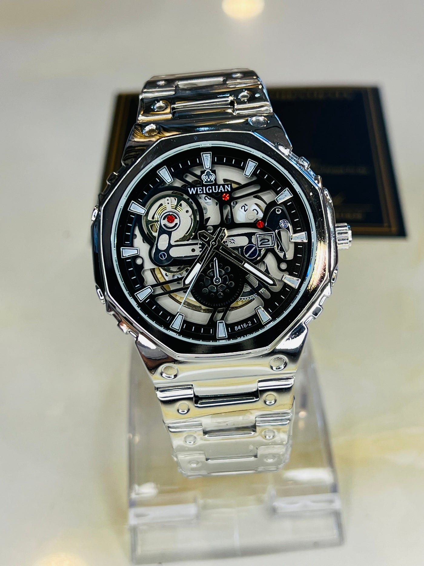 Weiguan Silver Black Skeleton Dial Watch